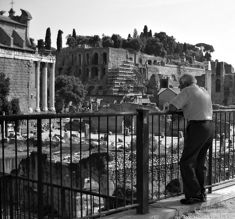 old man at Roman ruins
