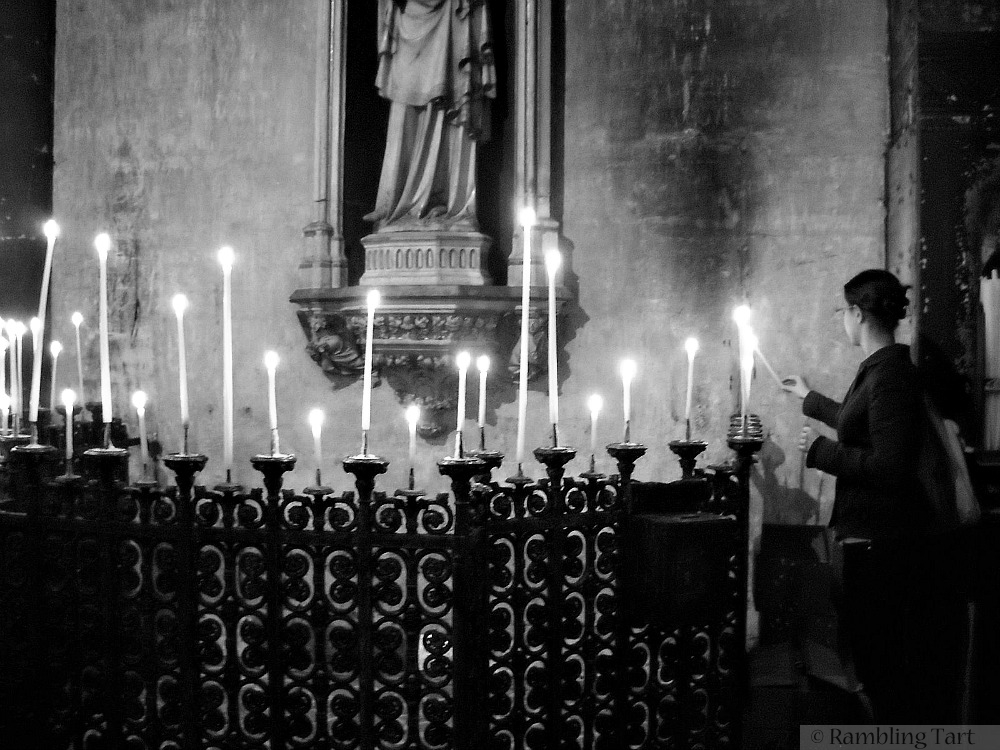 lighting candles in Paris